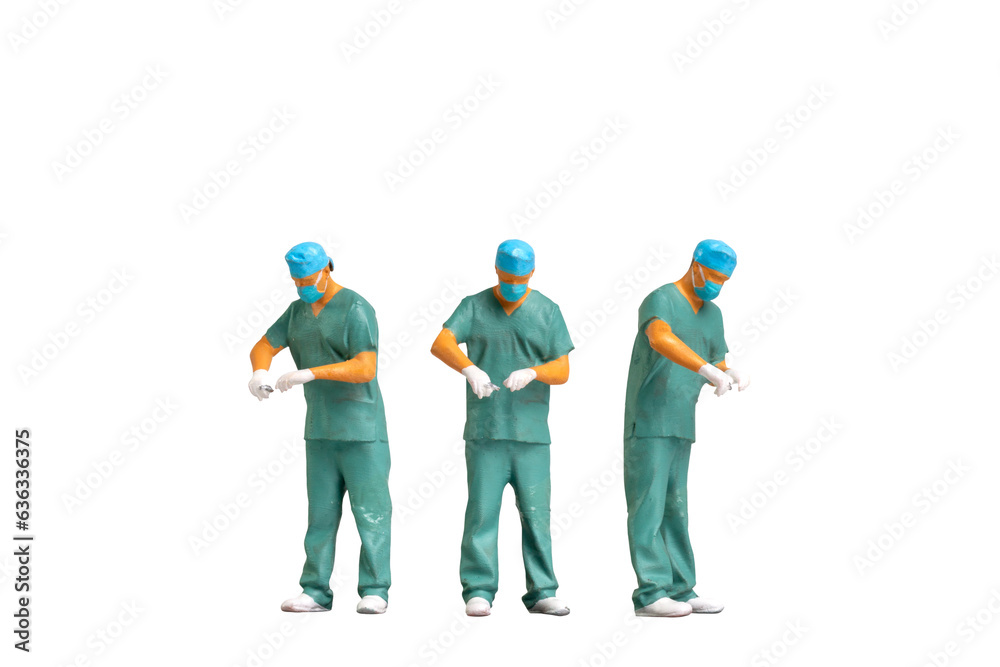 Miniature people Full length portrait of young doctor in scrubs Isolated on white background with clipping path