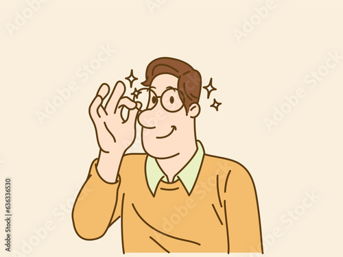 Young handsome smiling businessman in smart casual.