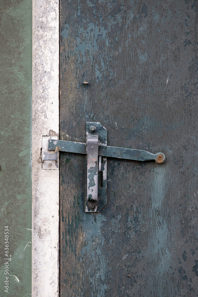 Old door handle on a barn door Old door handle on a barn door