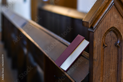 Old holy books and hymnals lying at the altar and in the church and on the pews in an old Scandinavian Christian church