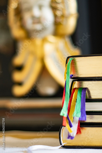 Old holy books and hymnals lying at the altar and in the church and on the pews in an old Scandinavian Christian church
