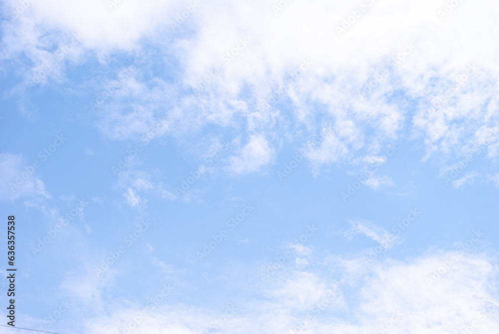 Photo of blue sky and white clouds, bright image. Background.