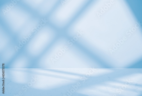 Gray background for product presentation with shadow and light from windows