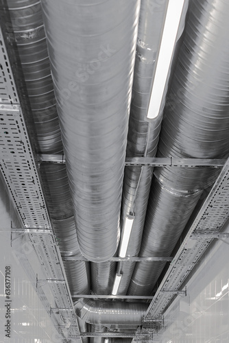 New installation of steel air conditioning duct pipes and  lighted dumps, installation of ventilation ducts during the renovation of building. Commercial cafe, restaurant, industrial space.