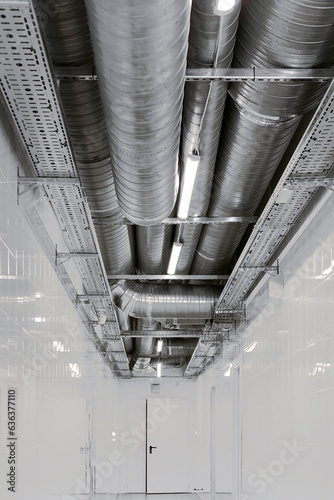 New installation of steel air conditioning duct pipes and  lighted dumps, installation of ventilation ducts during the renovation of building. Commercial cafe, restaurant, industrial space.