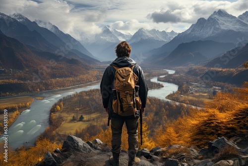 Adventurer backpacking in a breathtaking mountain landscape, wanderlust, travel exploration, outdoor adventure, backpacker's journey, majestic scenery, scenic views, daytime