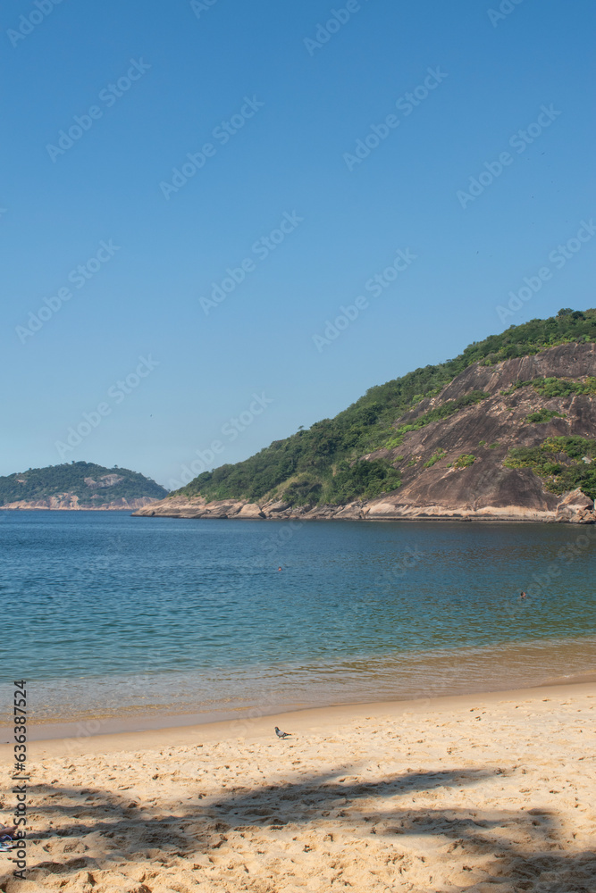 Rio de Janeiro, Brazil: palm trees shadow on Praia Vermelha beach (Red Beach), the beach at the foot of the Sugar Loaf (Pao de Acucar) in the wealthy residential neighborhood of Urca Rio de Janeiro, Brazil: palm trees shadow on Praia Vermelha beach (Red Beach), the beach at the foot of the Sugar Loaf (Pao de Acucar) in the wealthy residential neighborhood of Urca