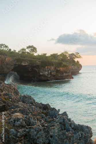 Fototapeta Naklejka Na Ścianę i Meble -  Beautiful rocky shore of the Indian Ocean. View of the rocks and blue waves
