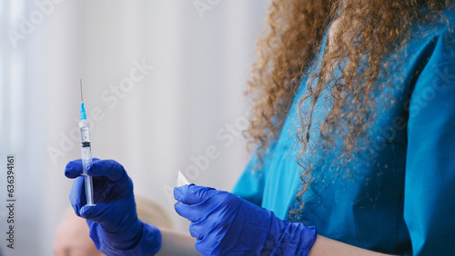 Photos Nurse injecting senior woman with a vaccine against covid-19, pandemic preventio