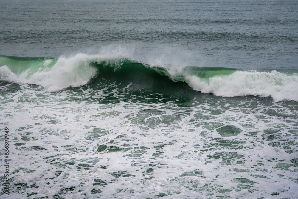 wave breaking on the beach wave breaking on the beach