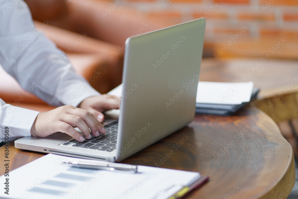 Fototapeta premium Happy young Asian Woman working on computer Business Data Analyst.