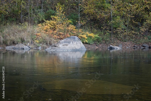 Scenic view of a rock shoreline of the Cheat River in West Virginia in autumn