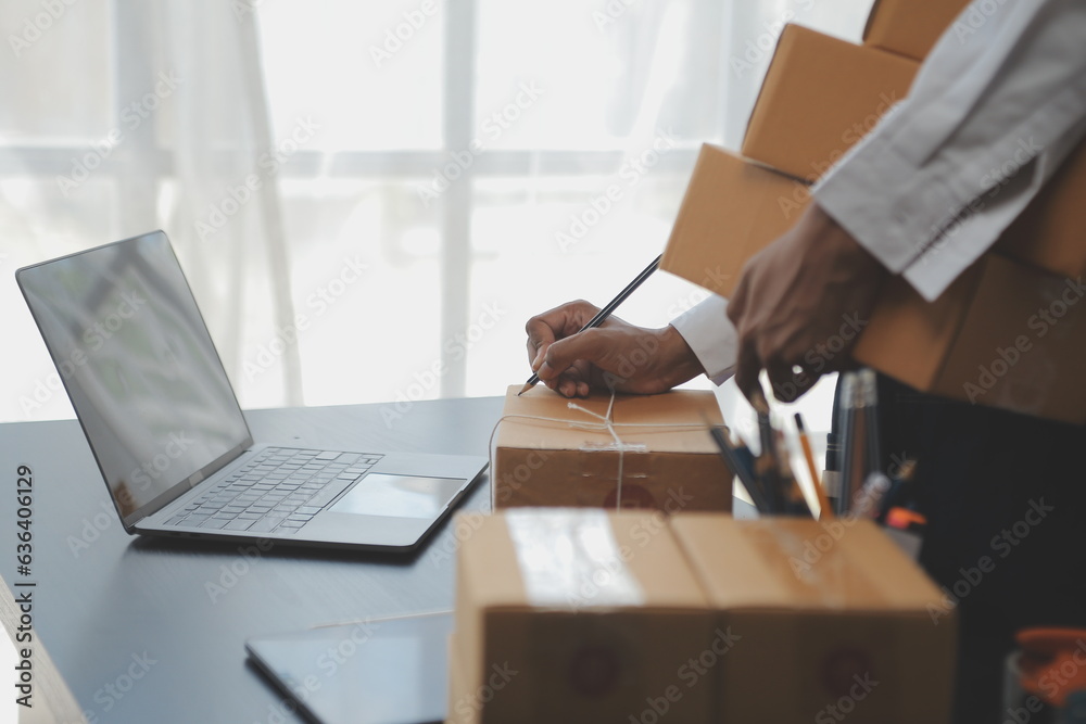 Starting small businesses SME owners female entrepreneurs Write the address on receipt box and check online orders to prepare to pack the boxes, sell to customers, sme business ideas online. Starting small businesses SME owners female entrepreneurs Write the address on receipt box and check online orders to prepare to pack the boxes, sell to customers, sme business ideas online.