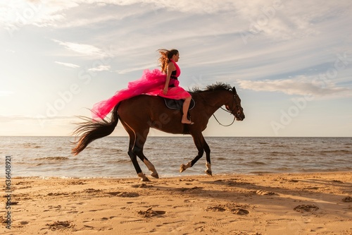 Young Caucasian woman riding a brown horse at the beach.