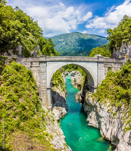 A view from the Soca river gorge towards the Napoleon Bridge near Kobarid, Slovenia in summertime