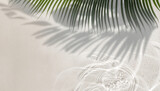 Palm leaf shadow on abstract white sand beach with sunlight in transparent water background photo