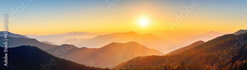 Sunset over the misty mountains