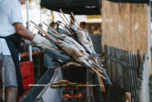fish grilled on a stick