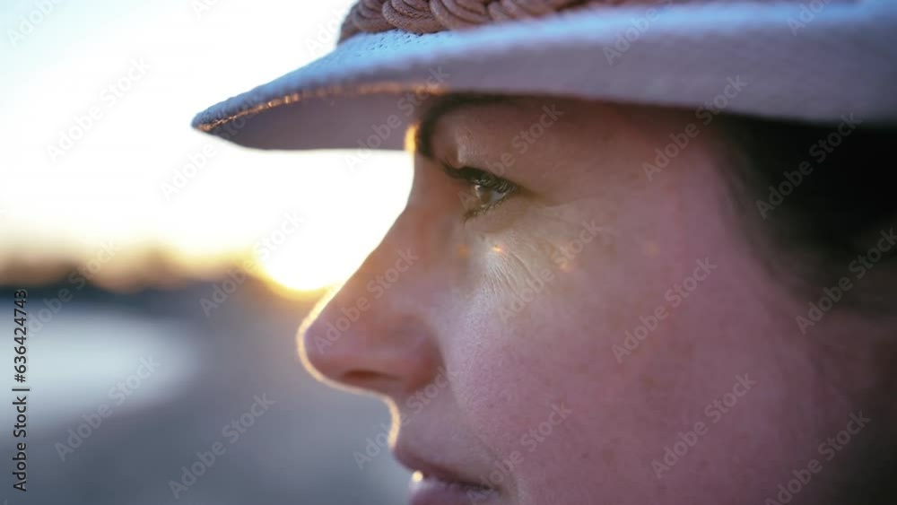 Gazing into the Horizon: Close-up of Confident Female Eyes Looking at the Evening Sea Gazing into the Horizon: Close-up of Confident Female Eyes Looking at the Evening Sea