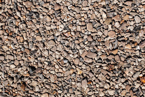 Obraz na płótnie Pebble stones background. Pavement made from natural materials. Top view. w salonie