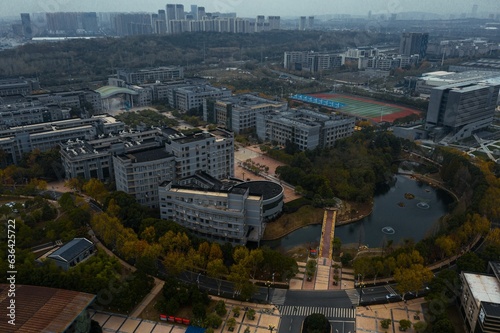 Aerial view of Wuhan's cityscape with a campus in deep winter