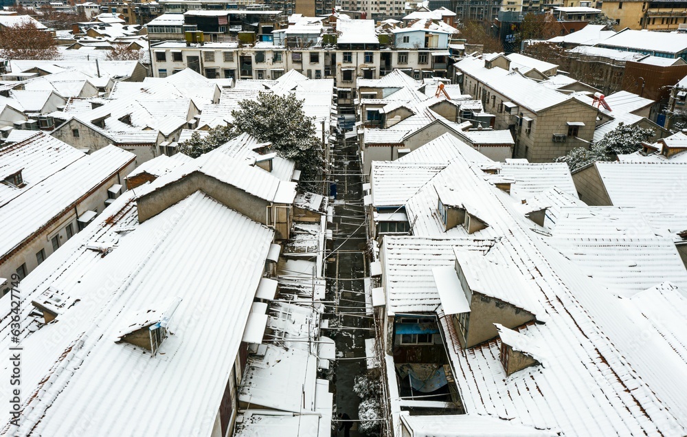 Aerial shot of buildings covered in snow in Wuhan, China. Aerial shot of buildings covered in snow in Wuhan, China.