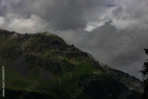 Scenic view of green mountains on a cloudy day in Majvdieri, Georgia