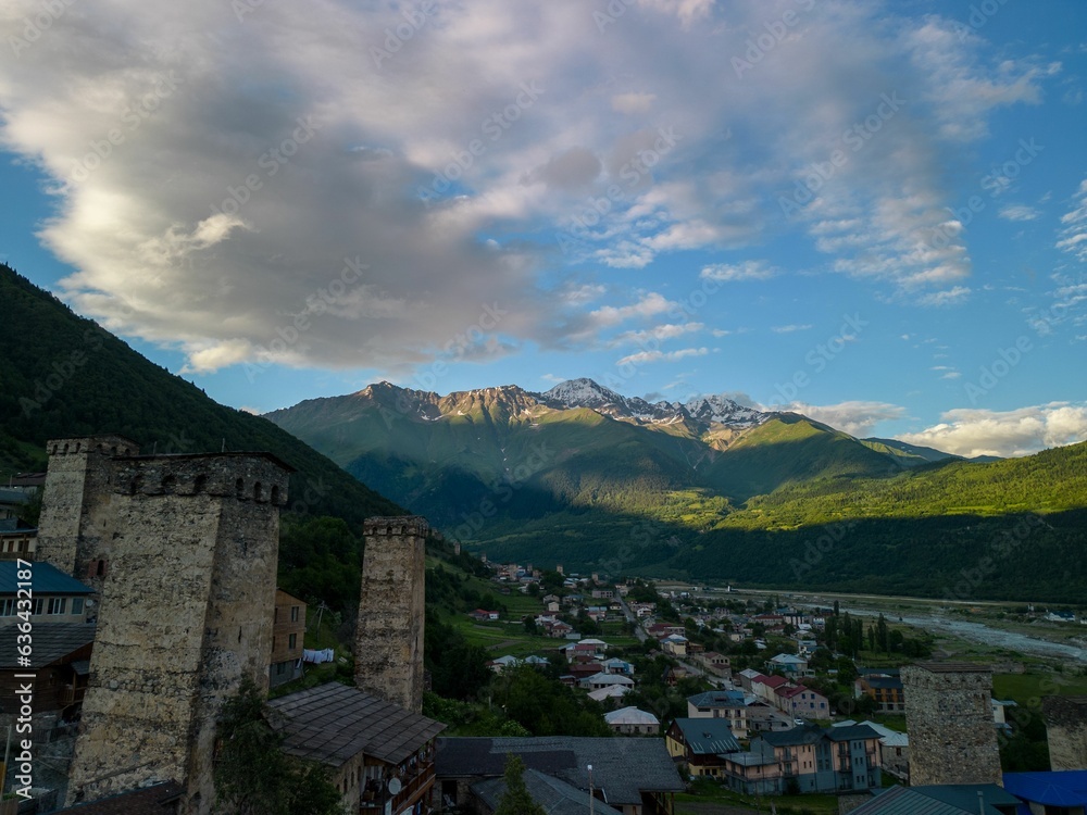 Obraz premium Aerial view of an old stone Mestia tower in a picturesque mountain village