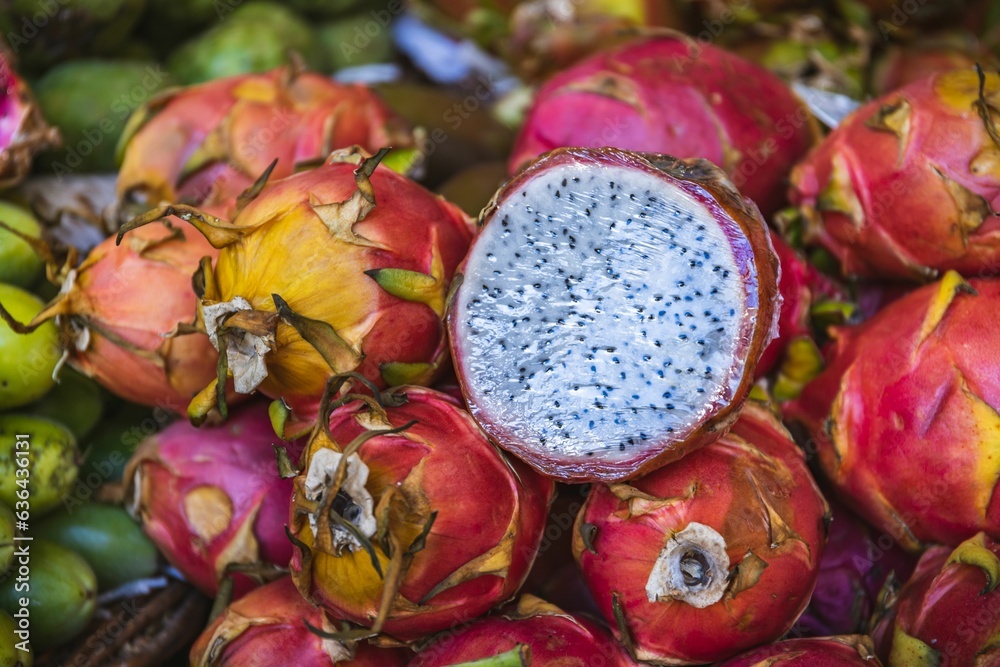 Closeup of a vibrant Pitaya for sale at an outdoor market