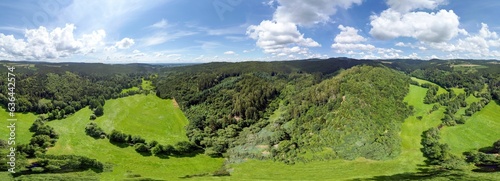 Aerial panoramic landscape of the beautiful green forested hills