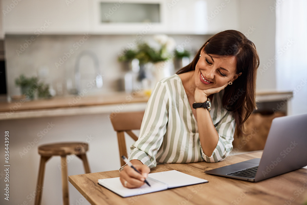 Portrait of a smiling businesswoman working from home. Portrait of a smiling businesswoman working from home.