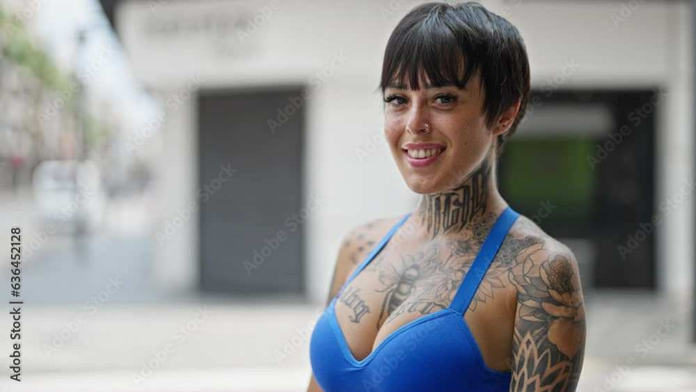 Young beautiful hispanic woman smiling confident standing at street