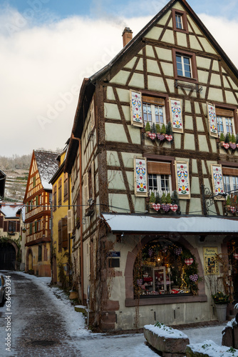 Kayserberg village at Christmas time in winter with Christmas decorations on the houses, Alsace, France.