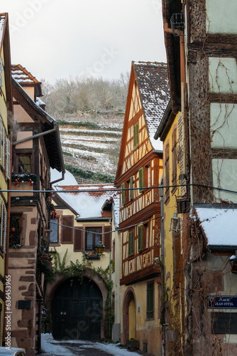 Kayserberg village at Christmas time in winter with Christmas decorations on the houses, Alsace, France.