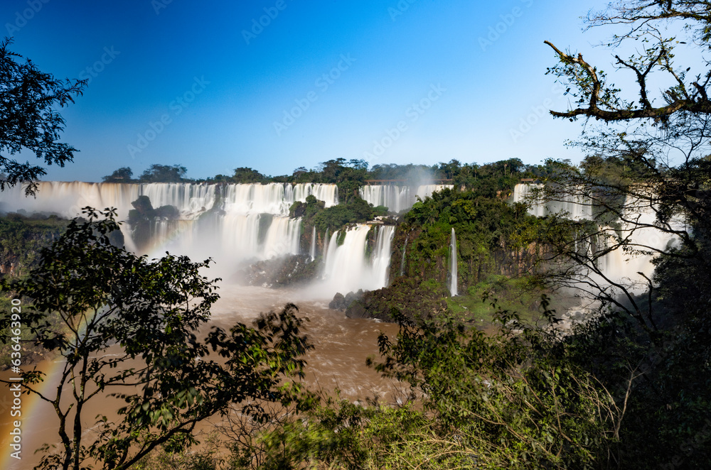 Fototapeta premium Iguazu Falls at Isla San Martin, one of the new seven natural wonders of the world in all its beauty viewed from the Argentinian side - traveling and exploring South America 