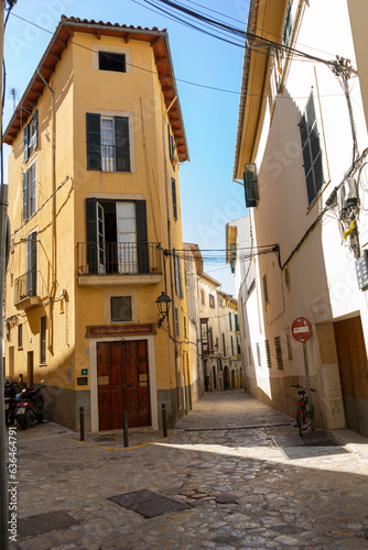 Discover the iconic stone structures and quaint balconies that grace the streets of Mallorca, a testament to Spain's rich heritage. © Fernando Cortés