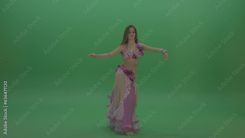 Delightful belly dancer in pink wear display amazing dance moves over chromakey background Delightful belly dancer in pink wear display amazing dance moves over chromakey background