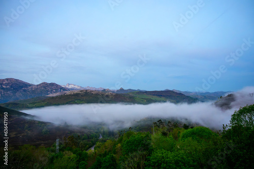 Morning cloudscape, travelling by car to mountain view points in Asturias, North of Spain, Picos de Europa mountain range