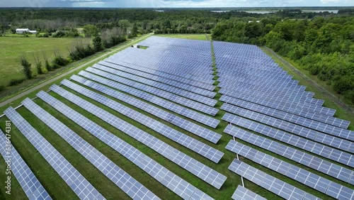 Wallpaper Mural Aerial Drone Shot of Solar Panel Renewable Energy Farm on Sunny Summer Day in Country Field Rural Canada Ontario Torontodigital.ca