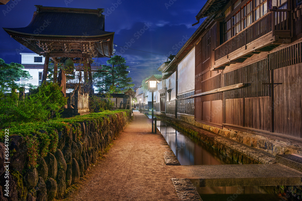 Hida, Gifu, Japan on Shirakabe Dozogai Street at night.