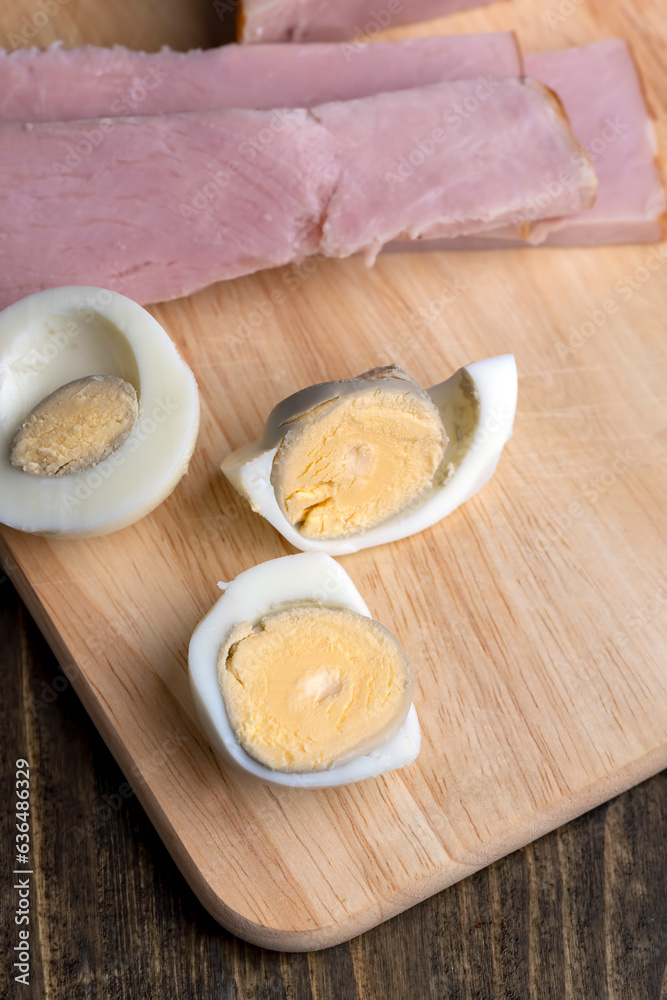 Boiled chicken egg with sliced pieces of meat Boiled chicken egg with sliced pieces of meat