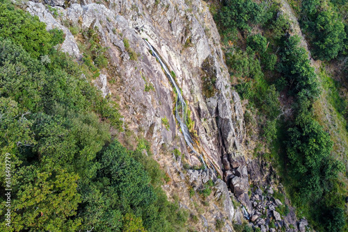Aerial view of the Frecha da Mizarela waterfall - the largest waterfall on the Iberian Peninsula. Serra da Freita, Portugal 2023. photo