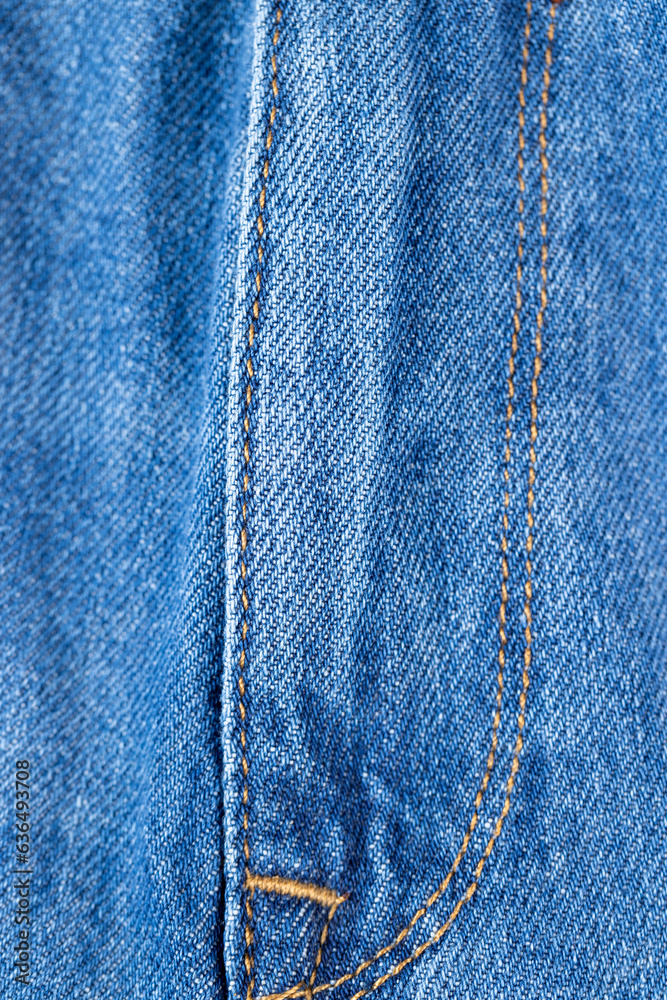 details of a blue denim fabric made of natural cotton details of a blue denim fabric made of natural cotton