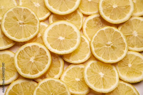 top down background view made of Fresh Sliced organic lemons close-up