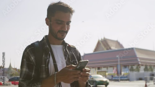 Male solo traveler exploring the bangkok city 