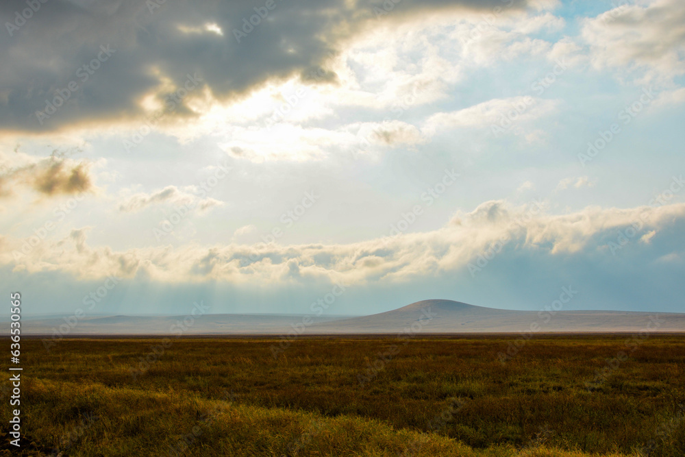 Morning landscape in Ngorongoro crater with clouds coming in over the crater rim, Tanzania