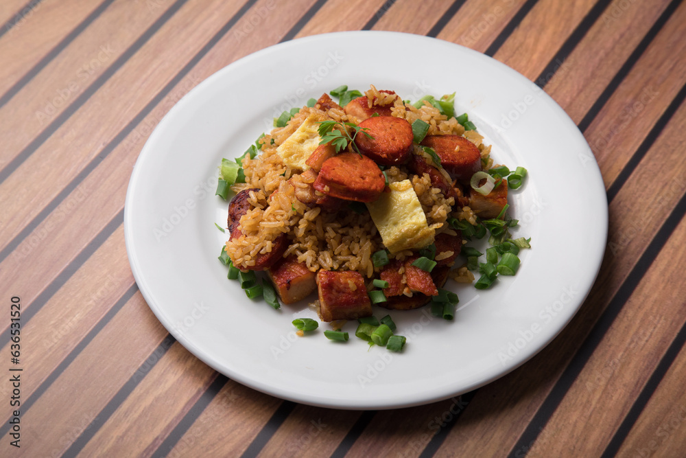 Chaufa amazonico fried rice with chorizo and  smoked pork cecina peru peruvian food