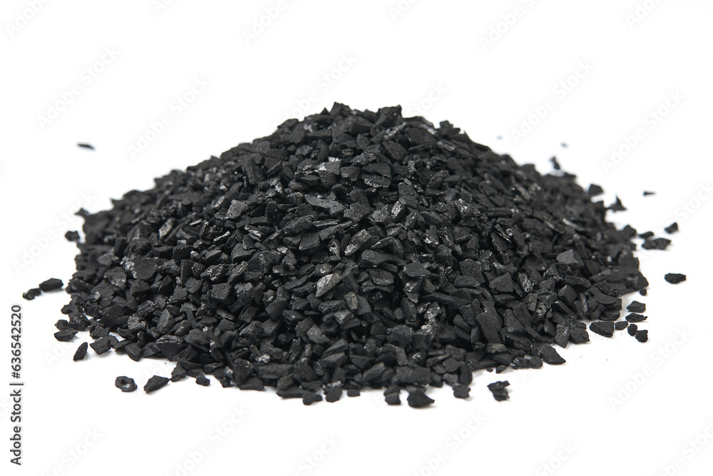 Pile of natural activated carbon scattered isolated on white background. activated carbon is used for effective applications in adsorption, removal of pollutants, water treatment, and energy, etc. Pile of natural activated carbon scattered isolated on white background. activated carbon is used for effective applications in adsorption, removal of pollutants, water treatment, and energy, etc.