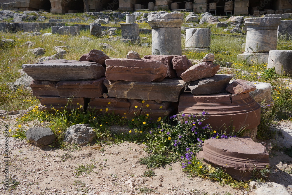 Fototapeta premium Ancient Greek columns parts at the archaeological site of Lindos Acropolis, Rhodes, Greece