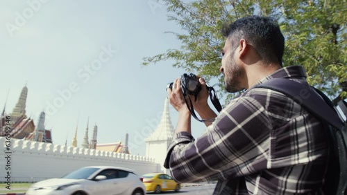 Man traveller taking photo